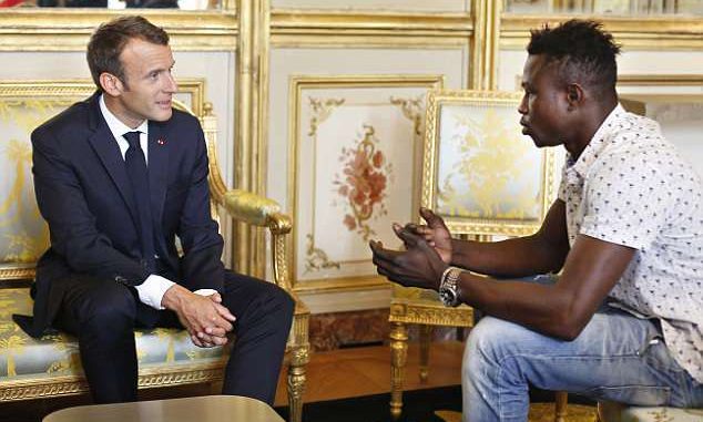 4CB1B6E500000578-5781689-Malian_immigrant_Mamoudou_Gassama_right_dubbed_Spider_Man_for_sc-a-4_1527588043284