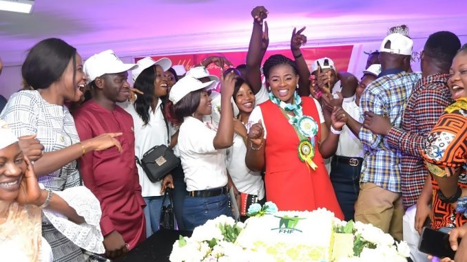 Funmilayo Adekojo Waheed in middle, sorrounded by beneficiaries of FAHF