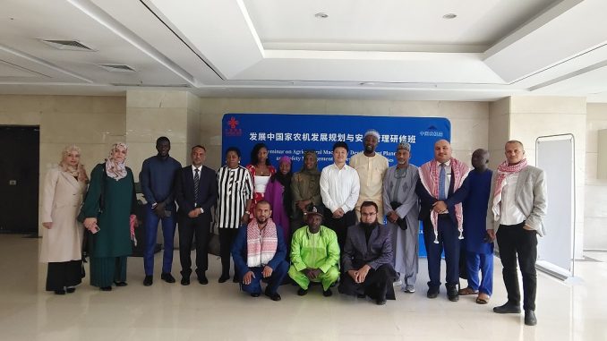 Group photo of presenter and participants at the seminar on agricultural machinery development ans safety management for developing countries
